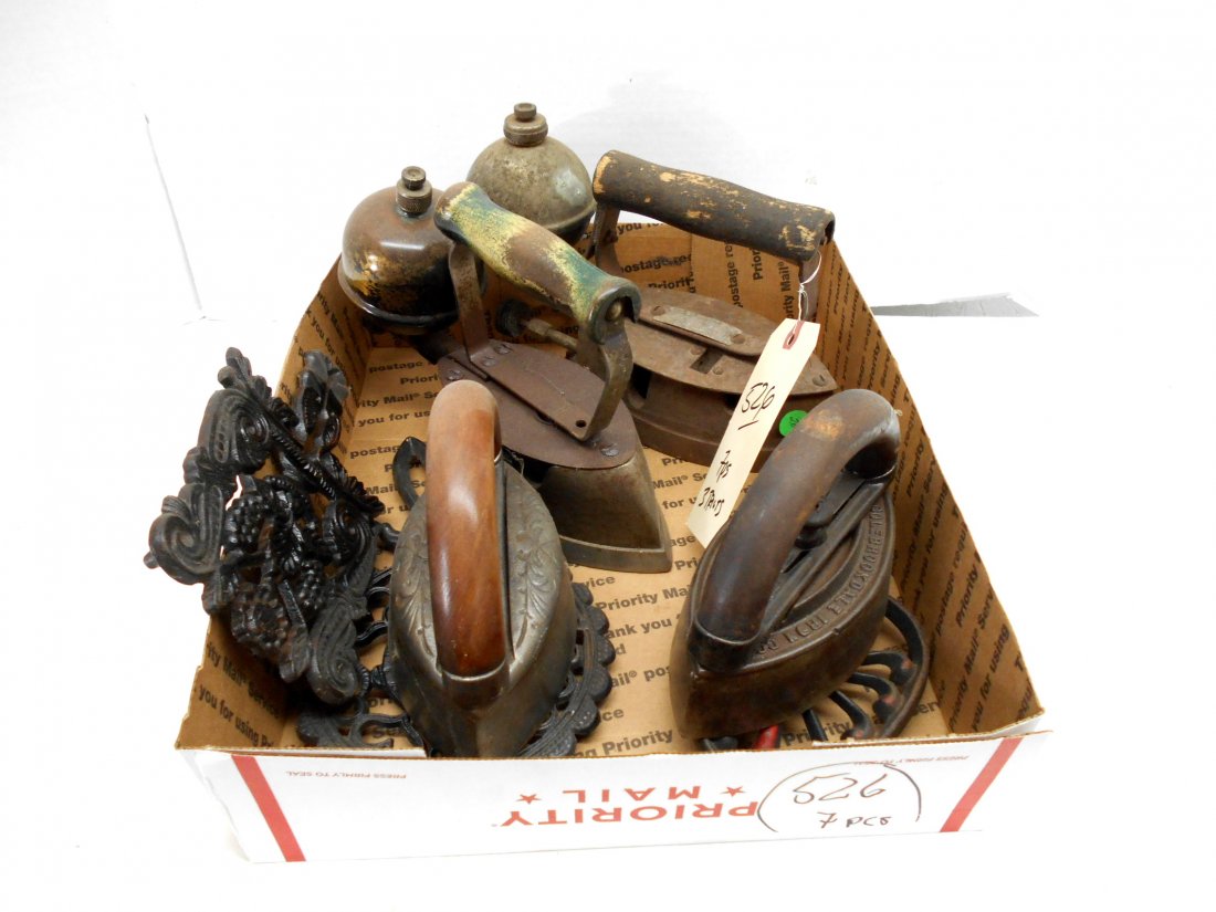 Antique Electric Irons: 7pcs. Assortment of 4 antique irons and 3 trivets. It is unknown if any of the sets are original.
