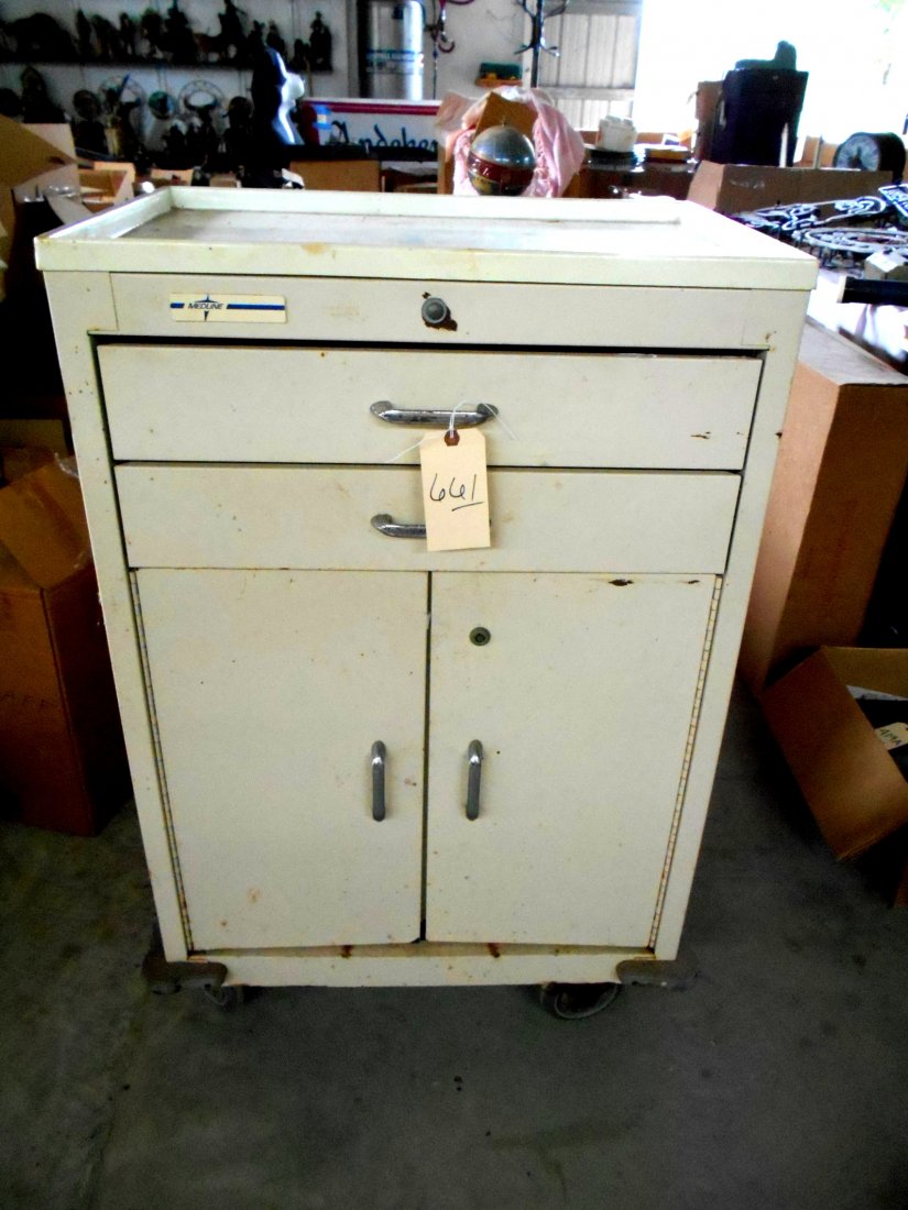 MEDLINE Off White Metal Medicine Cabinet: 2 drawers above, cabinet below. On rollers. Rust inside cabinet 43" tall x 26.75" wide x 18.25" wide