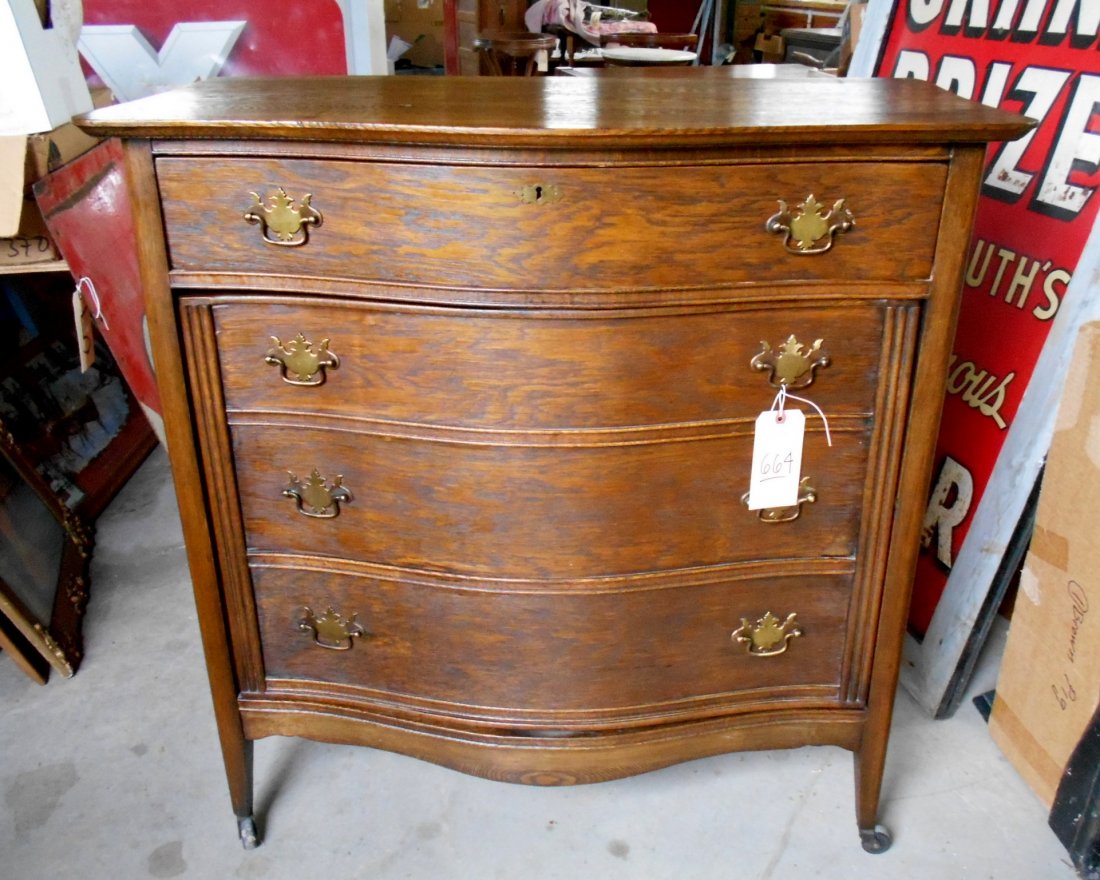 American Tiger Oak Dresser/Cocktail Bar Combo: Rare vintage early American tiger oak dresser/cocktail bar combination from the days of prohibition. At one look a dresser. Take a second look and it is actually a swing out bar for secretly entertain
