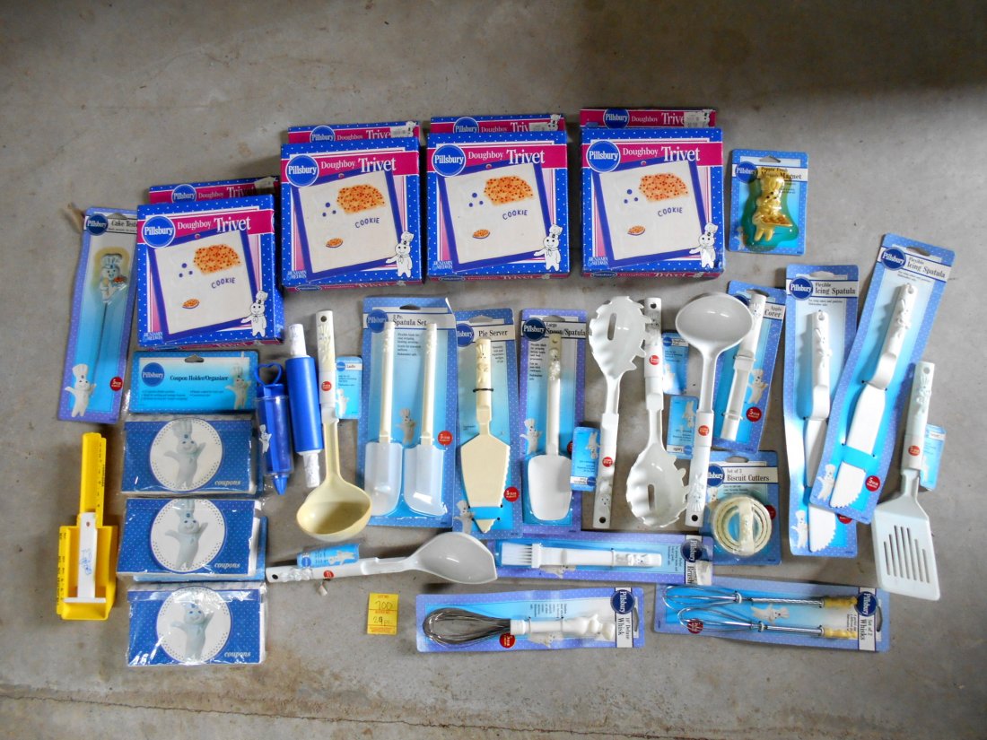PILLSBURY DOUGHBOY - Kitchen & Trivet Collection: 29 Pcs. PILLSBURY DOUGHBOY Kitchen Utensil & Trivet Collection. Pillsbury Doughboy kitchen collection including utensils, trivets, and coupon organizers.