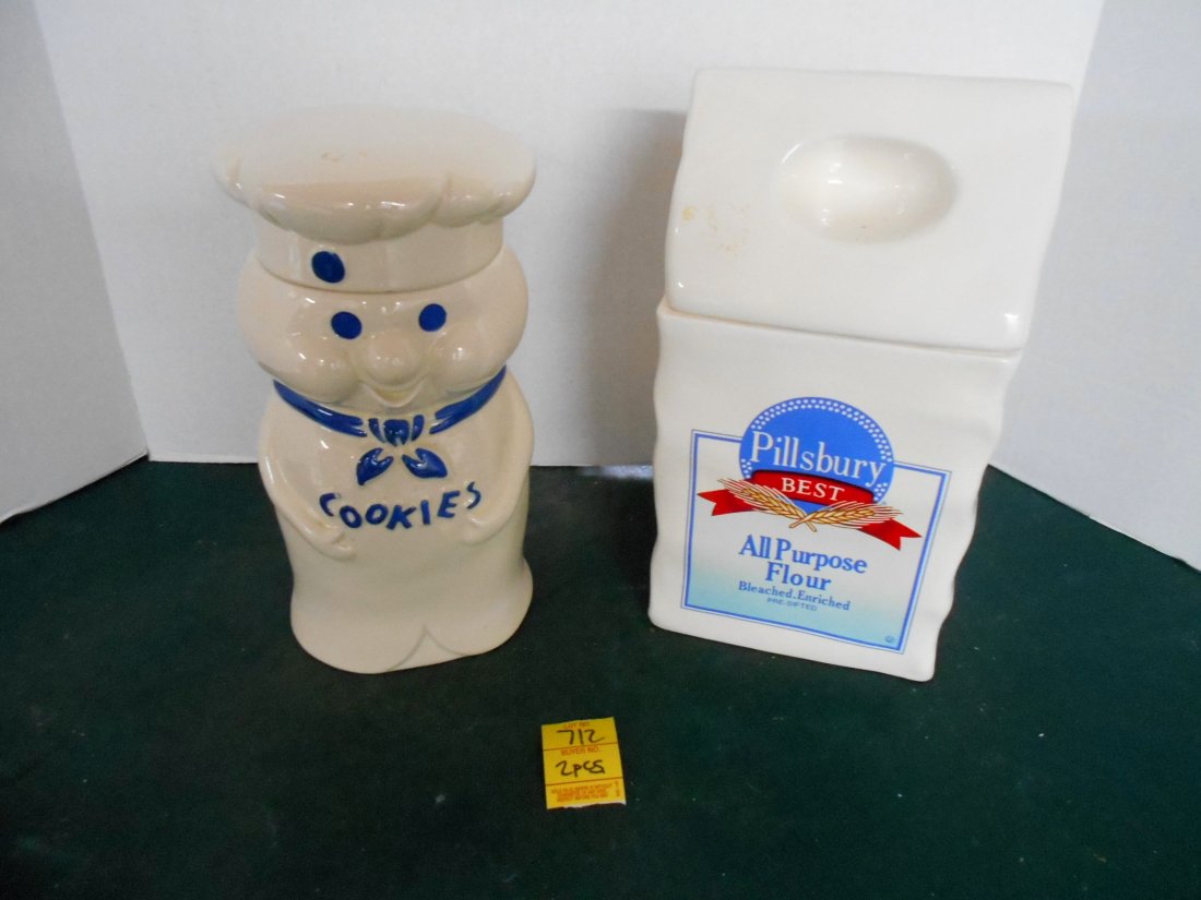 PILLSBURY DOUGHBOY Cookie Jars: 2 Pcs. Pillsbury Doughboy Cookie Jars, the one of the Doughboy is from the 1987, the flour sack jar is dated 1992. Comes in original box.