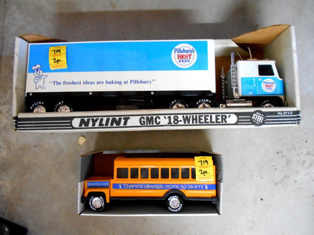 PILLSBURY DOUGHBOY Truck &School Bus Models: 2 Pcs. Lot with 18-Wheeler scale model Pillsbury Truck and Pillsbury Doughboy School bus. Both in original box. Truck measures 21" x 7". School bus measures 11" x 4.25".