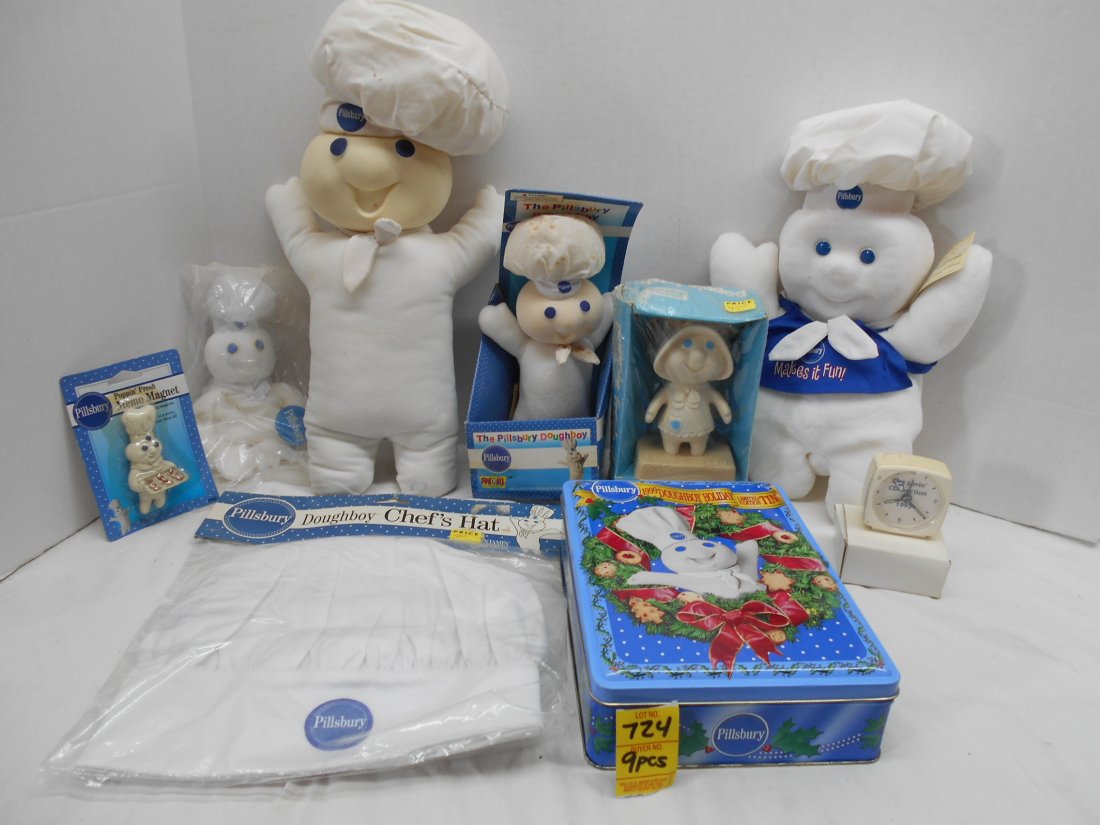 PILLSBURY DOUGHBOY Misc Items: 9 Pcs. Assorted Pillsbury Doughboy items including a chef's hat, a magnet, 5 dolls, & a cookie tin.