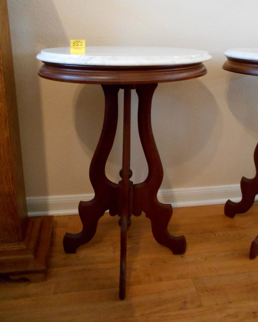 Antique American Victorian Lamp Table – Furniture: Antique American Victorian lamp table with white oval marble top. Very good condition. Finish clean, no chips/cracks on marble. Foot casters gone missing. 29” tall. Marble 21 ¾” x 16 3/4” x 1��