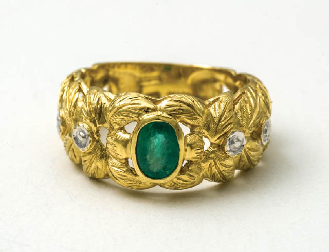 GOLD EMERALD RING 18K gold ring with oval cut emerald,: GOLD EMERALD RING 18K gold ring with oval cut emerald, and openwork gold filigree surround, 16.72mm stone, size 7.