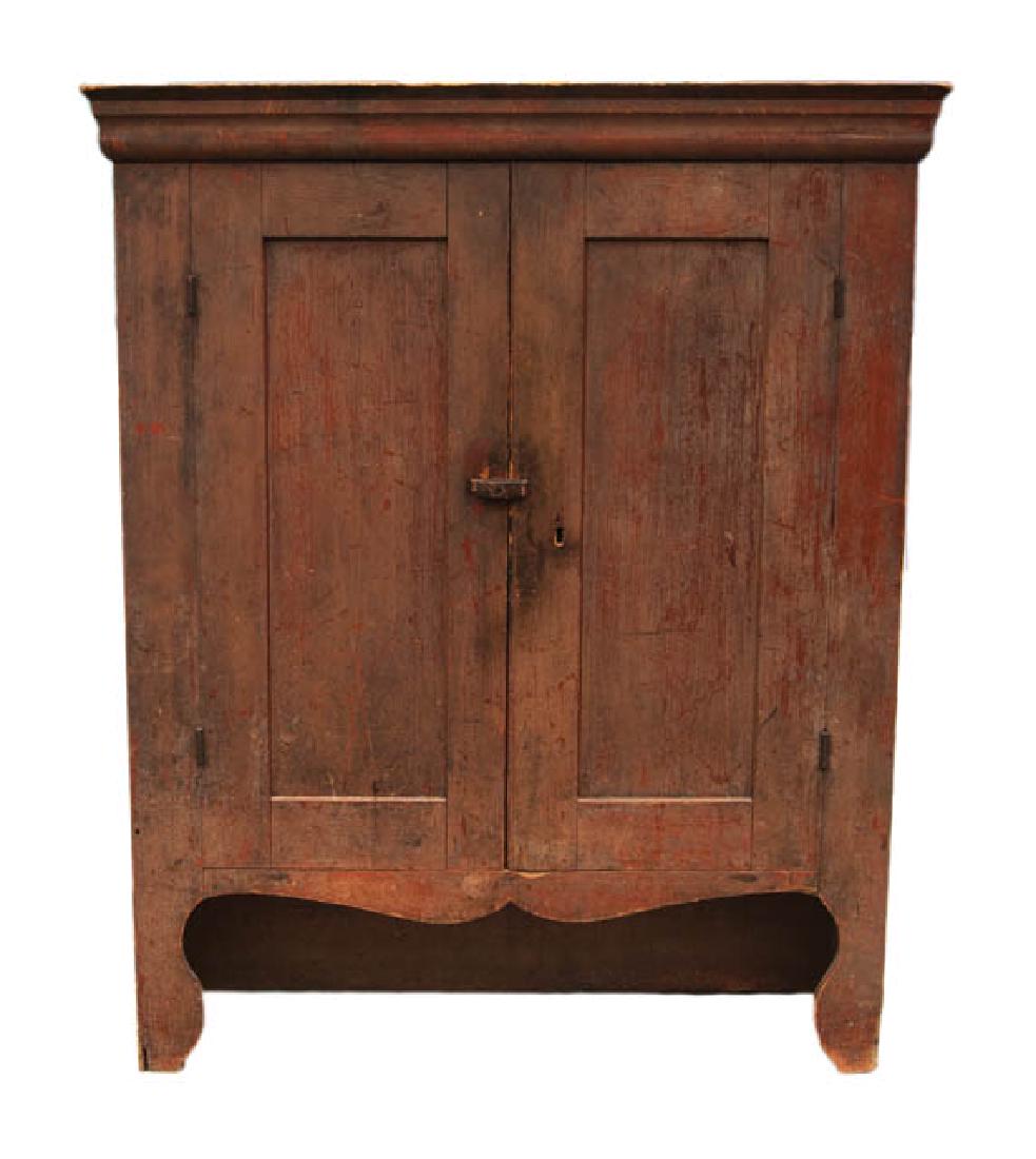 19TH C. JELLY CUPBOARD New England Country, pine,: 19TH C. JELLY CUPBOARD New England Country, pine, two-door jelly cupboard, in original brown/red painted finish, molded top, scrolled open carved base, 4' 7" h, 3' 9 1/2" w (at top), 13" d, (ex. Ed Cl