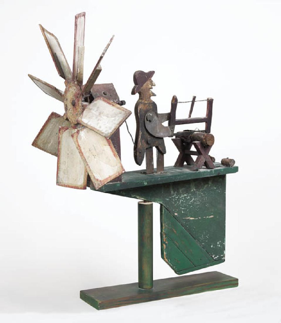 FOLK ART WHIRLIGIG Pine, in original paint decoration,: FOLK ART WHIRLIGIG Pine, in original paint decoration, gentleman in hat and tails sawing wood with a buck saw, eight paddles in red and white, 22" h, 17" l.
