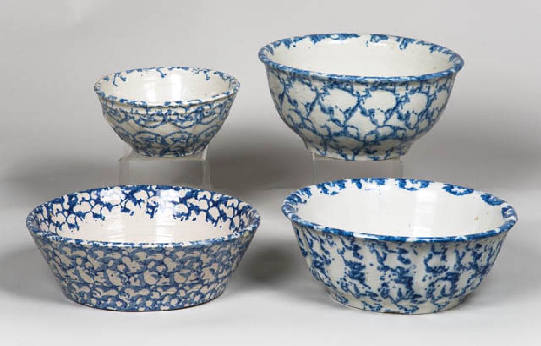 FOUR ANTIQUE SPONGEWARE BOWLS Blue and white mixing: FOUR ANTIQUE SPONGEWARE BOWLS Blue and white mixing bowls, all appear in good condition, (one with rim chip and also with very minor imperfections), three are 10" dia, one is 7" dia.