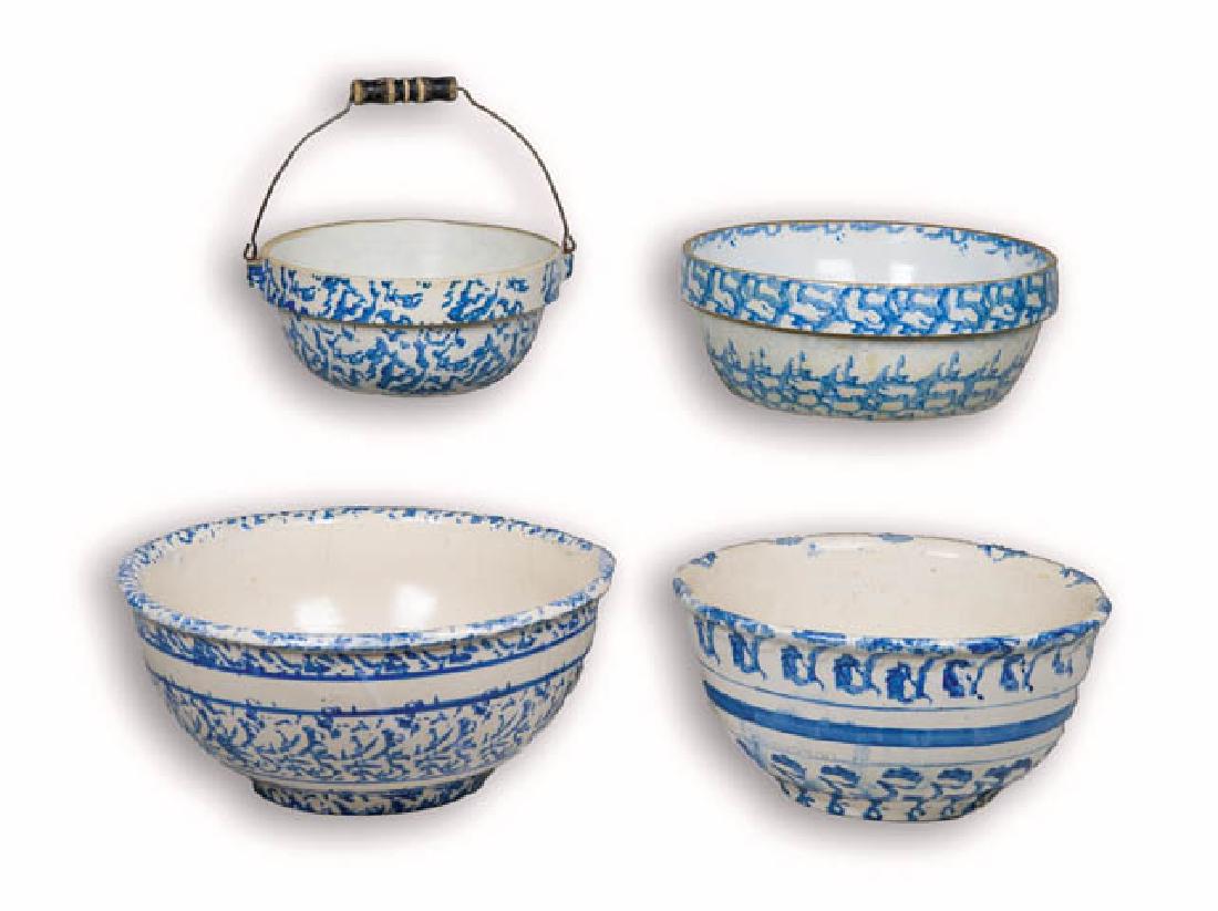 FOUR ANTIQUE BLUE SPONGEWARE BOWLS One with wire and: FOUR ANTIQUE BLUE SPONGEWARE BOWLS One with wire and wood bail handle, excellent condition, 8 1/2" dia; Larger bowl with thick raised edge, very good condition, 10 1/2" dia; Two larger bowls with whit