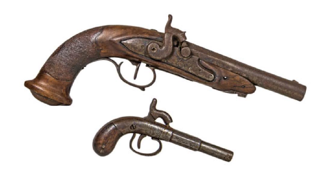 TWO PISTOLS 19th c. percussion pistol, with carved: TWO PISTOLS 19th c. percussion pistol, with carved walnut stock, engraved trigger guard, carved cross-hatched grip, tiger walnut stock, missing ram rod, 13" l; Ladies muff pistol, octagonal to round b