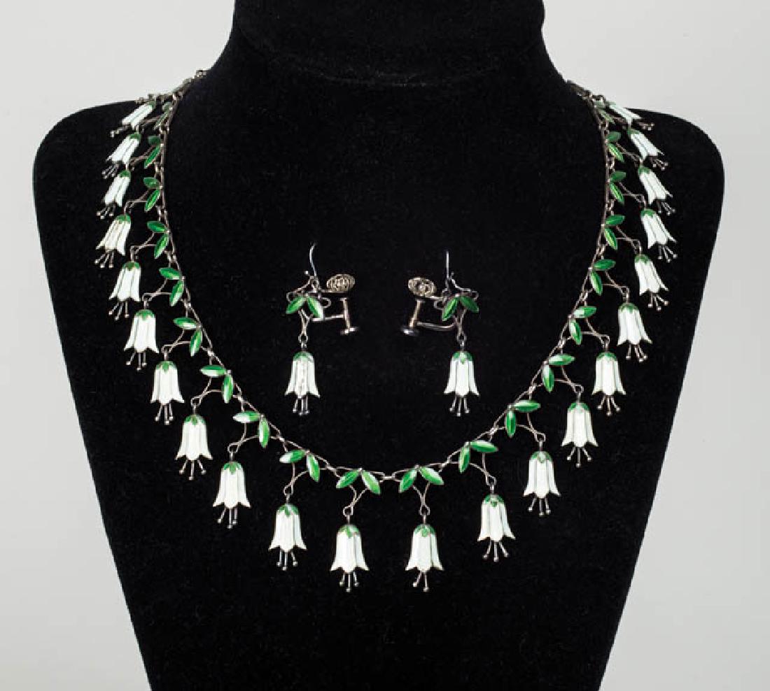 SILVER AND ENAMEL NECKLACE AND EARRINGS Victorian white: SILVER AND ENAMEL NECKLACE AND EARRINGS Victorian white and green enamel "Lily of the Valley" necklace, 16" l; and matching clip on earrings, descended in the Soloman Lincoln family of Hingham, MA.