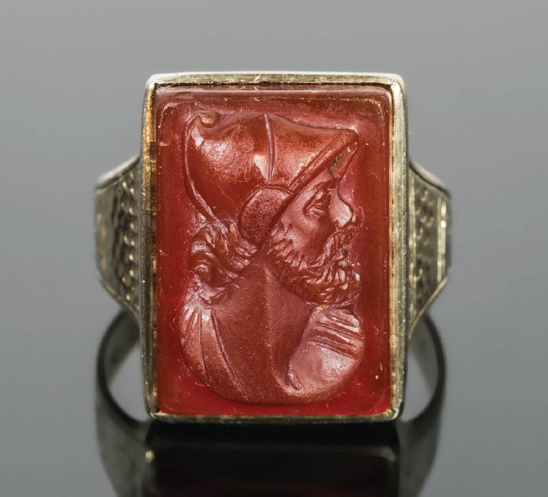 GENTLEMAN'S GOLD RING: GENTLEMAN'S GOLD RING 14K gold ring, with rectangular carved carnelian stone, depicting a bearded Roman nobleman, size 11, finely engraved, 9.12 gms.