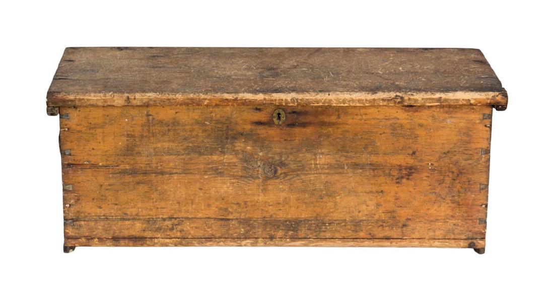 EARLY 19TH C. SEA CHEST: EARLY 19TH C. SEA CHEST New England, pine, old refinish, canted front, dovetailed, old rope beckets, replaced strap hinges, interior till, 14" h, 38" w, 14" d.