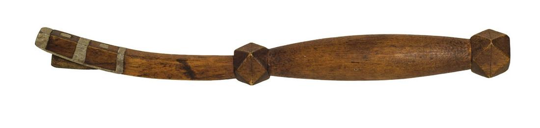 EARLY MACKERAL KNIFE Carved mahogany knife, inset with: EARLY MACKERAL KNIFE Carved mahogany knife, inset with pewter bands at blade handle, with carved sailor's knots at both ends, finely carved, 9 1/2" l, (ex. estate of Justin Cobb).