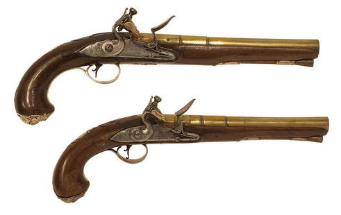 EXCEPTIONAL PAIR OF FLINTLOCK PISTOLSTapered brass: EXCEPTIONAL PAIR OF FLINTLOCK PISTOLSTapered brass barreled pistols, made by Rimes of London, , the octagon to round barrels are engraved "Rimes London", and exhibit four proof marks, the lock plates