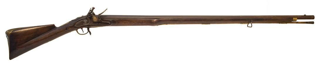 FLINTLOCK MUSKETRare 1st model Brown Bess, 46" barrel,: FLINTLOCK MUSKETRare 1st model Brown Bess, 46" barrel, .75 cal, and original wooden ramrod, vey fine condition, carried by Grenediers at Lexington and Concord, double hallmarked with "Crown and GR",