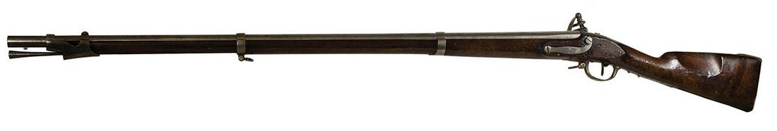 FLINTLOCK MUSKET, .69 CALEngraved on barrel tang "M: FLINTLOCK MUSKET, .69 CALEngraved on barrel tang "M 1777", most likely made in Charleville but unmarked, brass pan, 42 1/2" barrel, 57" l.
