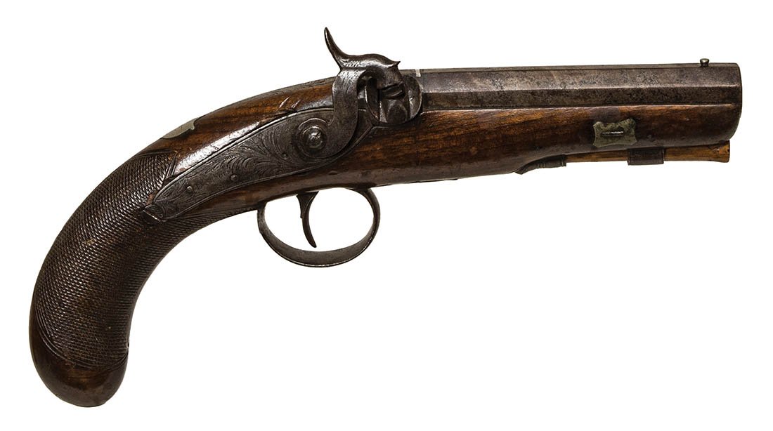 BRITISH PERCUSSION PISTOLCirca 1840, octagon barreled: BRITISH PERCUSSION PISTOLCirca 1840, octagon barreled traveling pistol, engraved "London", lock plate is engraved by the maker "Westwood", displays engraved trigger guard, small silver acorn escutcheo