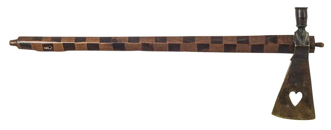 TOMAHAWKBrass pipe tomahawk with a cut out heart: TOMAHAWKBrass pipe tomahawk with a cut out heart, diamond-shaped eye, tapered diamond-shaped haft, with file branded "checkerboard" decoration, minor wear, age undetermined, 24 1/2" l.