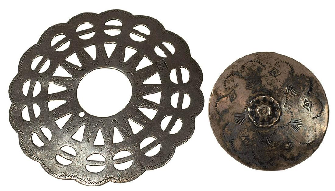 TWO SILVER BROOCHESRound silver brooch, made for the: TWO SILVER BROOCHESRound silver brooch, made for the early Indian trade, with an early Canadian maker's stamp, illustrated in National Museums of Canada, Indian Ceremonial and Trade Silver, Ottawa, 19