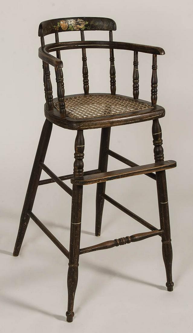 LATE 19TH C. CHILD'S HIGH CHAIRCane seat, footrest,: LATE 19TH C. CHILD'S HIGH CHAIRCane seat, footrest, brown paint with decorative bentwood back, 23" seat h, 32" overall h.