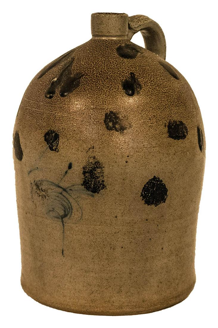 19TH C. STONEWARE JUGLarge 4-gallon stoneware jug, with: 19TH C. STONEWARE JUGLarge 4-gallon stoneware jug, with brown glazed spots and blue stylized flower, 17" h.