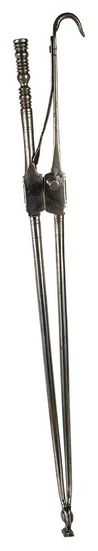 18TH C. PIPE TONGSWhitesmith engraved, handled pipe: 18TH C. PIPE TONGSWhitesmith engraved, handled pipe tongs, hook for hanging, pipe tamper, tapered tongs terminating in rounded disks, excellent overall condition, 19" l.