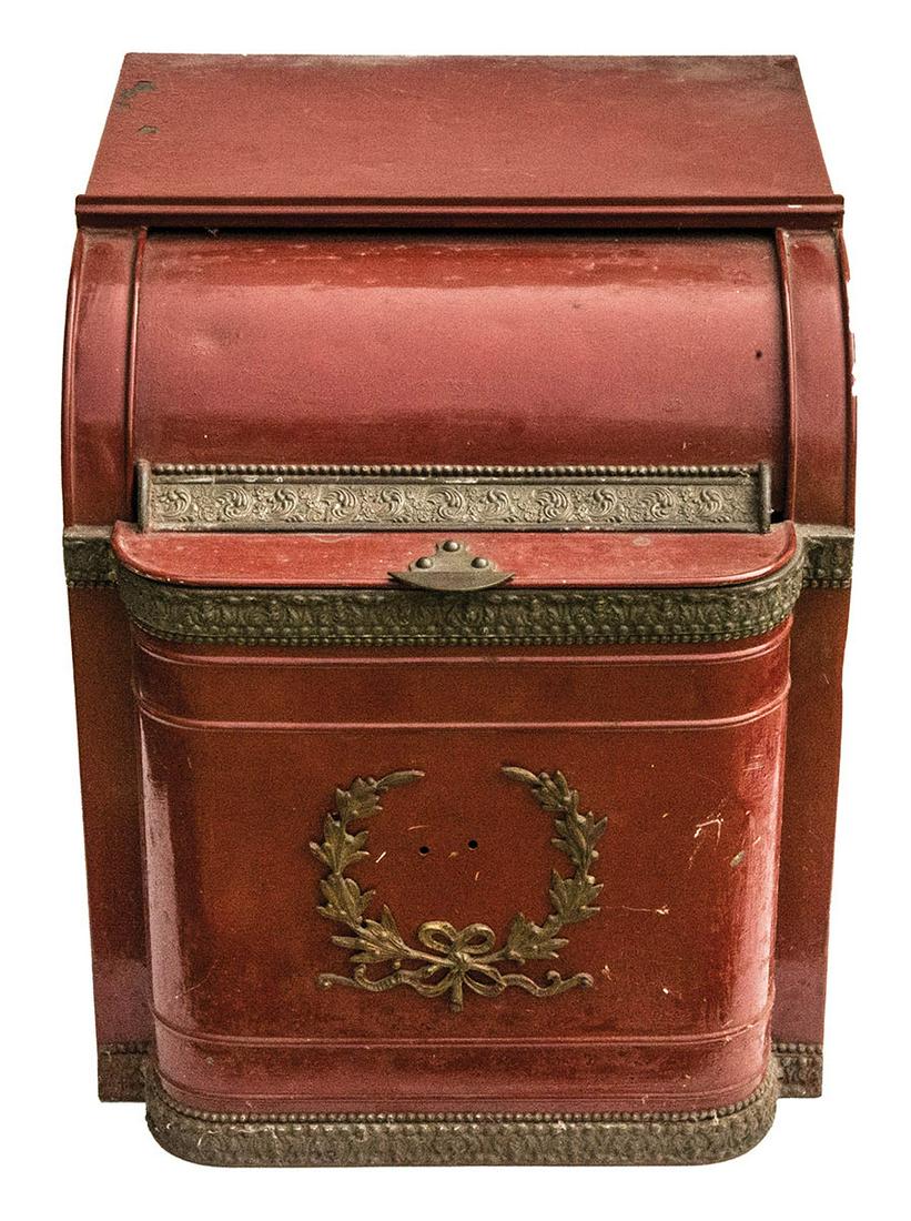 DECORATED TEA BIN19th c. tin tea container, with curved: DECORATED TEA BIN19th c. tin tea container, with curved lift lid, decorated brass with wreath, repainted red, 22 1/2" h, 19" w, 22" d.