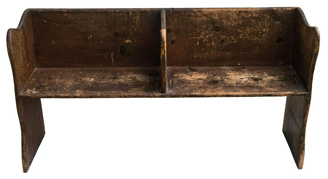 EARLY 19TH C. PINE SCHOOL BENCHNew England, carved: EARLY 19TH C. PINE SCHOOL BENCHNew England, carved sides, fastened section board in the middle, old patina finish, (right front shows old repair), 26 1/2" h, 50" w, 13 1/2" d.