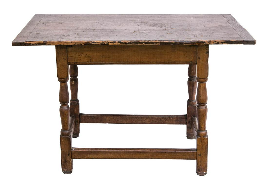 18TH/EARLY 19TH C. TAVERN TABLENew England, pine tavern: 18TH/EARLY 19TH C. TAVERN TABLENew England, pine tavern table, breadboard top, turned vase and ring legs, box stretcher, labeled on bottom "Portsmouth to Boston", "Belonged to Grandpa's library in Gar