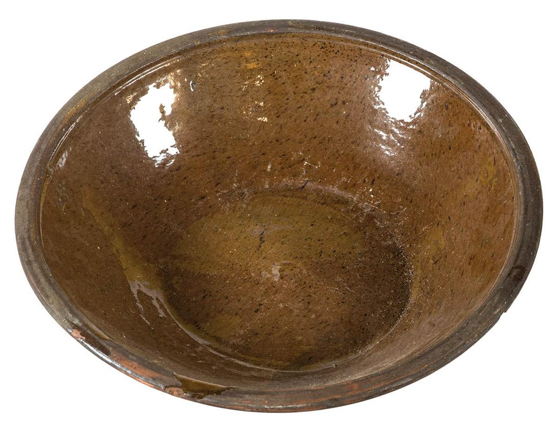 19TH C. AMERICAN REDWARE MILK PANBrown speckled glazed: 19TH C. AMERICAN REDWARE MILK PANBrown speckled glazed interior, overall good condition, 3 1/2" h, 15" dia.