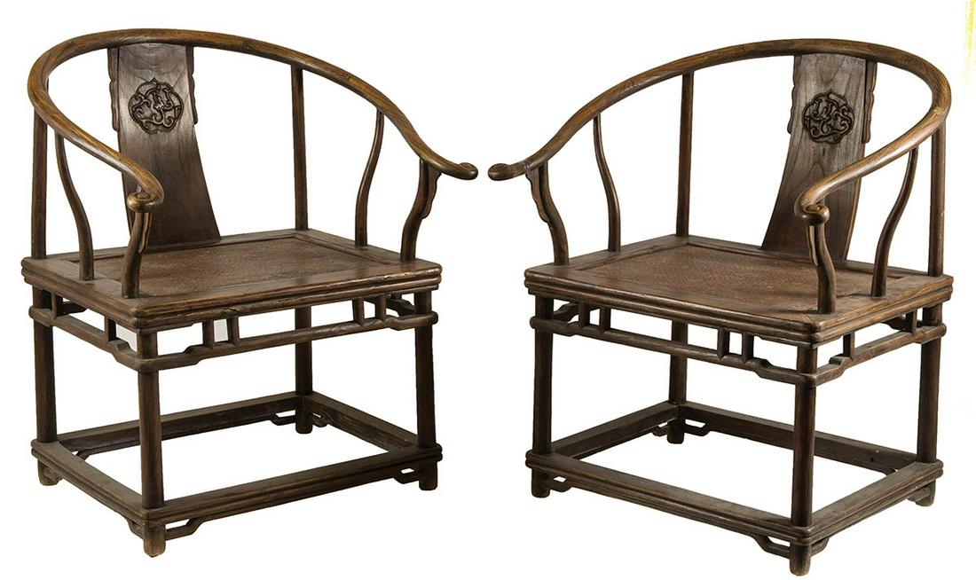 PAIR OF CHINESE PALACE CHAIRSCurvilinear backs, bent: PAIR OF CHINESE PALACE CHAIRSCurvilinear backs, bent splat with carved floral motif, woven cane seats on board, square stretcher base, 40 1/2" h, 30" w, 25" d, (23" w x 17" seats).