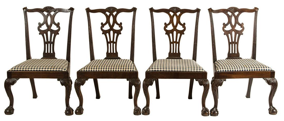 CHIPPENDALE STYLE SIDE CHAIRSSet of four mahogany: CHIPPENDALE STYLE SIDE CHAIRSSet of four mahogany chairs, carved crest, pierced back splat, finely carved knees with cabriole legs, terminating in claw and ball front feet, slip seats, 17" seat h, 36"