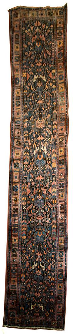 PERSIAN KURDISH RUNNERShows animals, birds, trees of: PERSIAN KURDISH RUNNERShows animals, birds, trees of life, signed and dated at one end, good condition, semi-antique, 3' 7" x 15' 4".