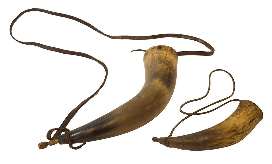 FOUR POWDER HORNSAn 11 1/4" l horn; and an 11 1/2" l: FOUR POWDER HORNSAn 11 1/4" l horn; and an 11 1/2" l horn; one is missing its small end plug, and the other plug is broken off in the horn; An 8" l powder horn; and a 13 1/4" l horn, with a forged nai