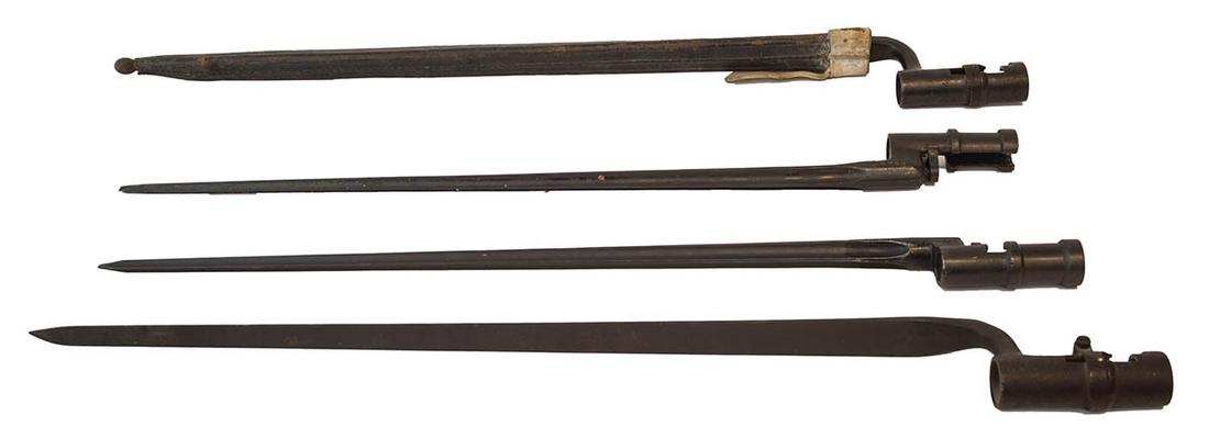 FOUR BAYONETSTwo "US S" bayonets, one includes a sheath: FOUR BAYONETSTwo "US S" bayonets, one includes a sheath stamped "2482, 1884", both 21" l; Two "Model 1891/30 Russian" bayonets, one is stamped "45258, box with X in it", the other "8263", both have cr