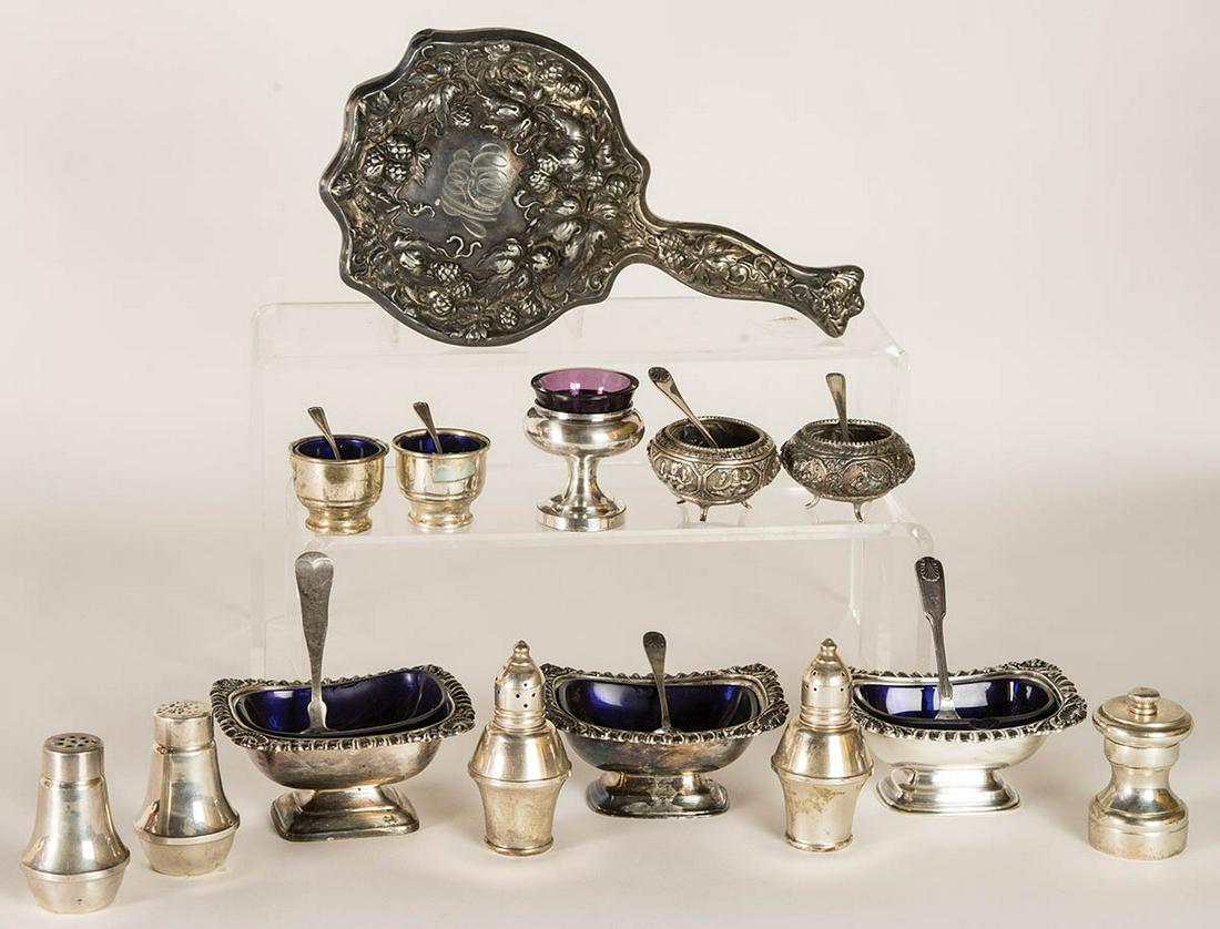 SILVER AND GLASS ITEMSFourteen pieces, master salts,: SILVER AND GLASS ITEMSFourteen pieces, master salts, salt shakers, and a Victorian hand mirror.