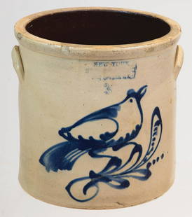 19TH C. STONEWARE CROCKThree-gallon crock, "New York: 19TH C. STONEWARE CROCKThree-gallon crock, "New York Stoneware Co.", large cobalt blue bird with fancy tail on a leafy plant, some minor chipping around rim, side handles, 11" h, 11" dia.