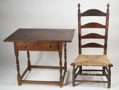 TAVERN TABLE, AND FIRESIDE CHAIR18th c. New England: TAVERN TABLE, AND FIRESIDE CHAIR18th c. New England tavern table, pegged pine breadboard top, maple turned base, original box stretcher, dovetailed drawer, 19th c. brass pulls, 25" h, 32" w, 21" d;