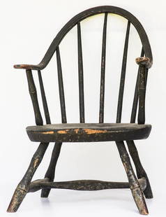 RARE CHILD'S WINDSOR CHAIRContinuous arm, very early: RARE CHILD'S WINDSOR CHAIRContinuous arm, very early green painted finish, bamboo turned arm supports, seven spindles, carved saddle seat, bamboo turned raking legs, stamped on bottom "T.C. Hayward",