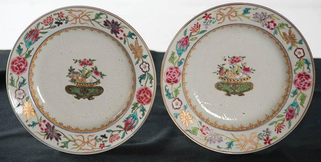 TWO CHINESE PLATESLeaf and floral decoration, with bowl: TWO CHINESE PLATESLeaf and floral decoration, with bowl of flowers in center, carved decoration in center surround.