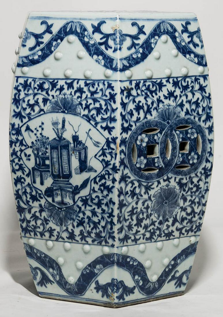 19TH C. CHINESE GARDEN SEATBlue and white garden seat,: 19TH C. CHINESE GARDEN SEATBlue and white garden seat, hexagonal shape, openwork sides with trailing floral vines, on white borders at top and bottom, with raised circular dots, intricate painted gard