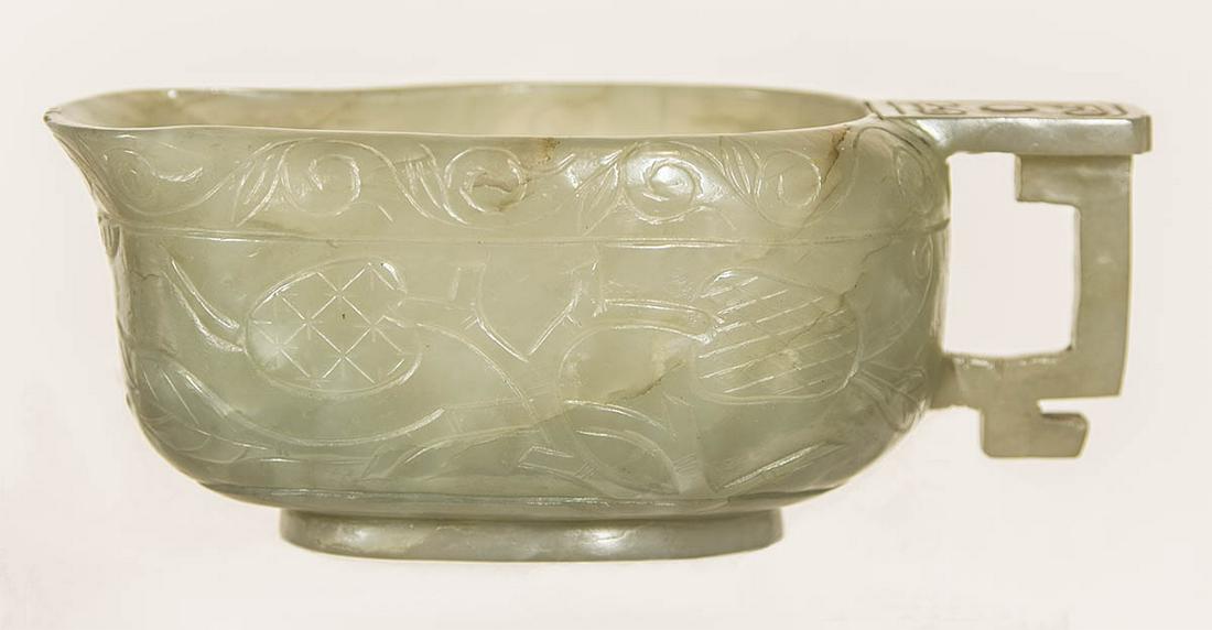 CHINESE JADE CUPHandled cup, vaseline color, carved (1 of 2)