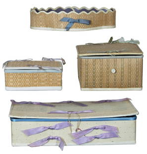 FOUR SISTER'S POPLARWARE BOXESLidded and edged with kid leather, tied with blue and purple silk: FOUR SISTER'S POPLARWARE BOXESLidded and edged with kid leather, tied with blue and purple silk ribbons, long rectangular box with blue silk lined interior is ink stamped "Sabbathday Lake Shakers,