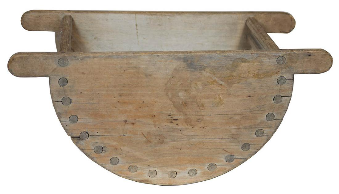 LAUNDRY CARRIERPine, original unfinished patina, half round form, with handles at top for two: LAUNDRY CARRIERPine, original unfinished patina, half round form, with handles at top for two Sister's to carry wet laundry, 19 turned and carved slats mortised through the sides, 10 1/2" h, 23 1/2" l