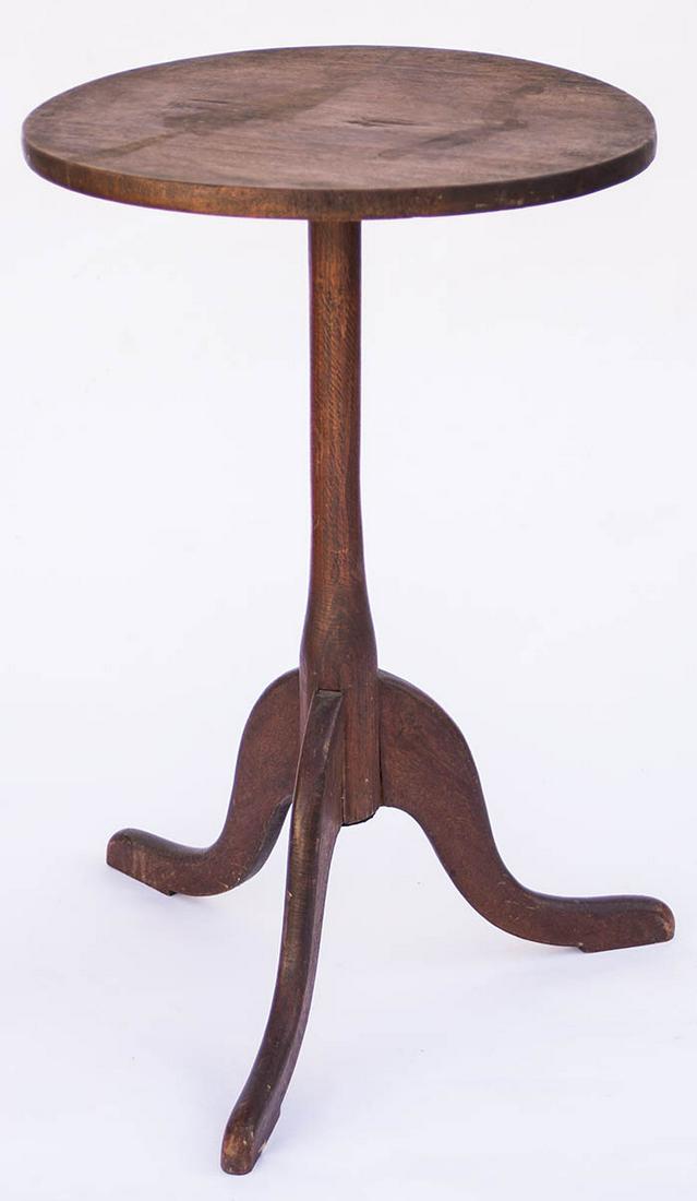 CANDLESTANDWalnut, original dark varnish stained finish, one board circular top, with original small: CANDLESTANDWalnut, original dark varnish stained finish, one board circular top, with original small rounded, rectangular cleat and wood pegged into shaft, attached to top with six screws, tall slende
