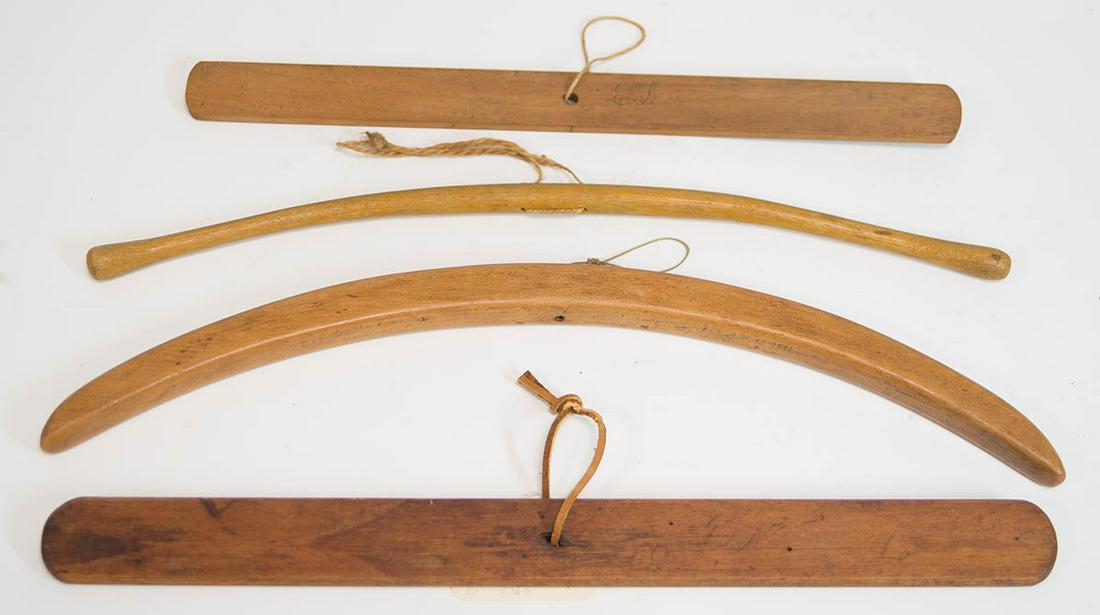 FOUR SHAKER HANGERSMaple, fruitwood and birch, two are inscribed with Shaker's initials, "EB" and: FOUR SHAKER HANGERSMaple, fruitwood and birch, two are inscribed with Shaker's initials, "EB" and "TN", c. 1850, 14" to 17" l.
