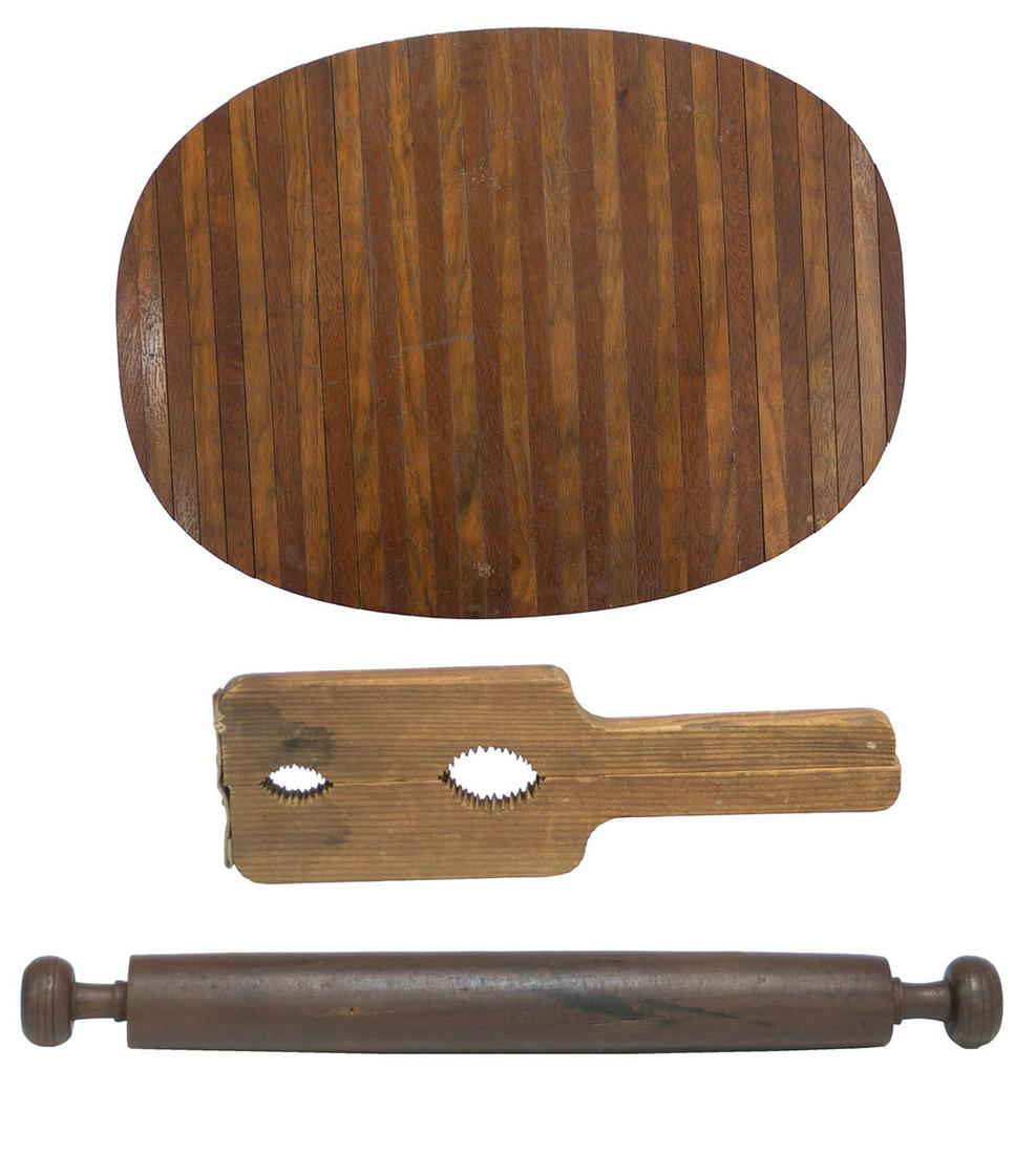 HOT PLATE MAT, CORK SETTER, AND ROLLING PINOval variegated strips, held together with felt: HOT PLATE MAT, CORK SETTER, AND ROLLING PINOval variegated strips, held together with felt (replaced), Enfield, CT, c. 1880-1900, 12" l, 9" w; Rare wood tool for placing corks in Shaker medicine and h