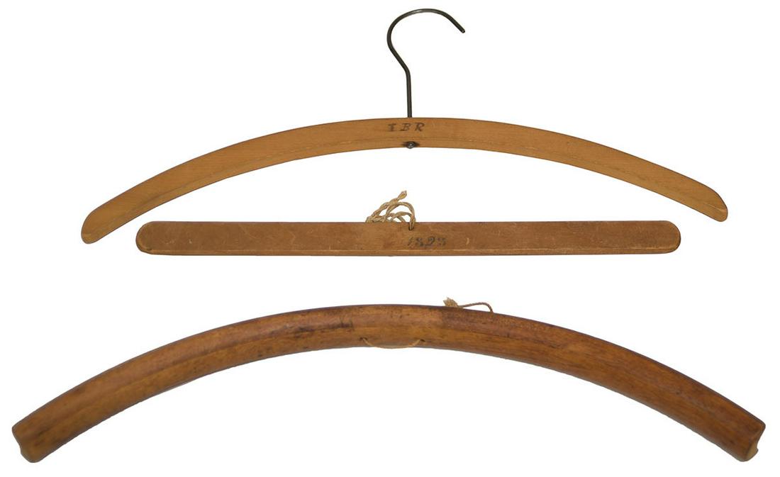 THREE SHAKER CLOTHES HANGERSPine and maple, straight hanger dated "1823", and initialed "D+A", (1 of 1)