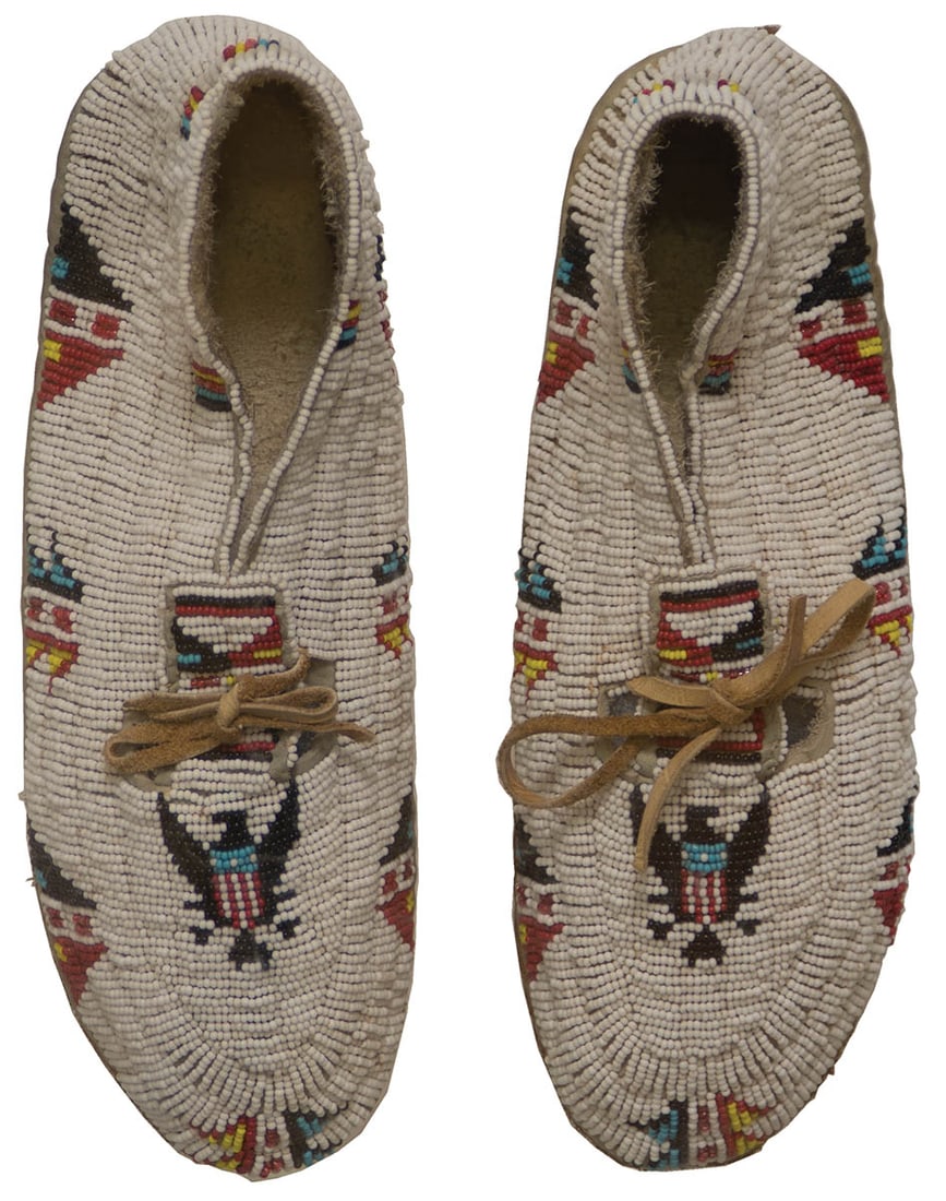 PAIR OF SIOUX BEADED MOCCASINS With blue American eagle decorated vamps, white backgrounds, cased in (1 of 1)